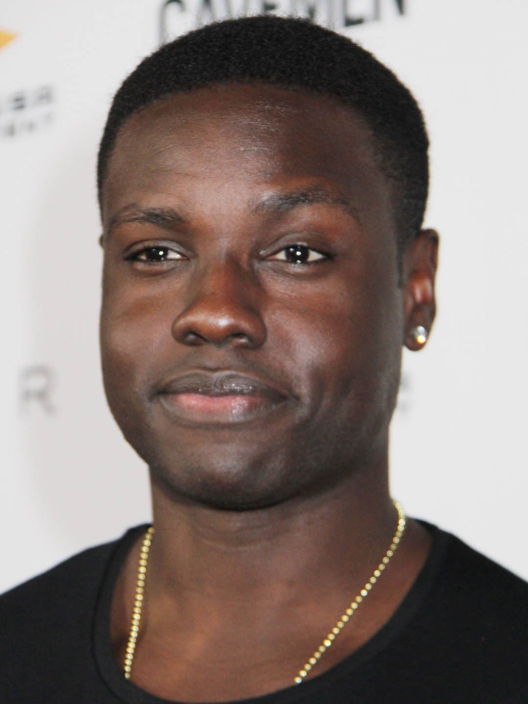 How tall is Dayo Okeniyi?